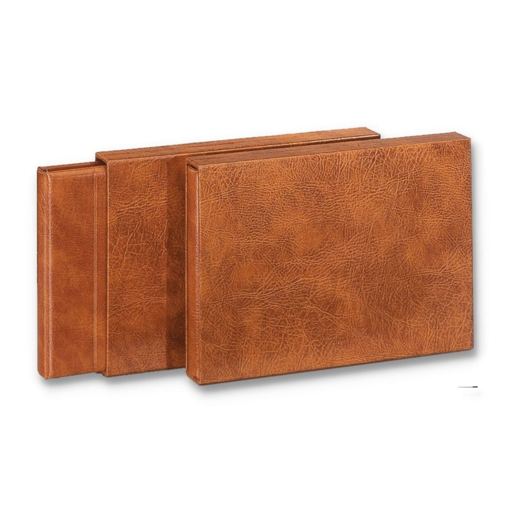 Two tan 'Speciality system' albums on a white background