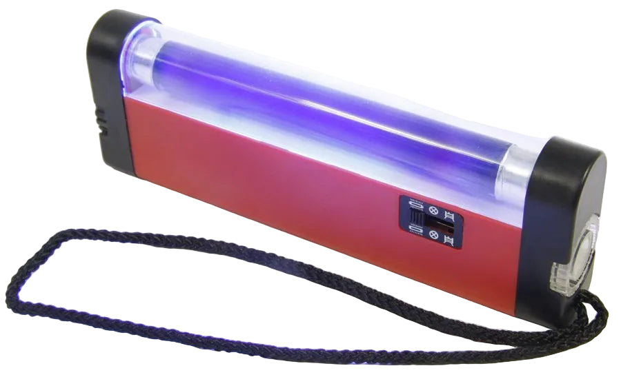 Red and black UV light device with a wrist strap on a white background