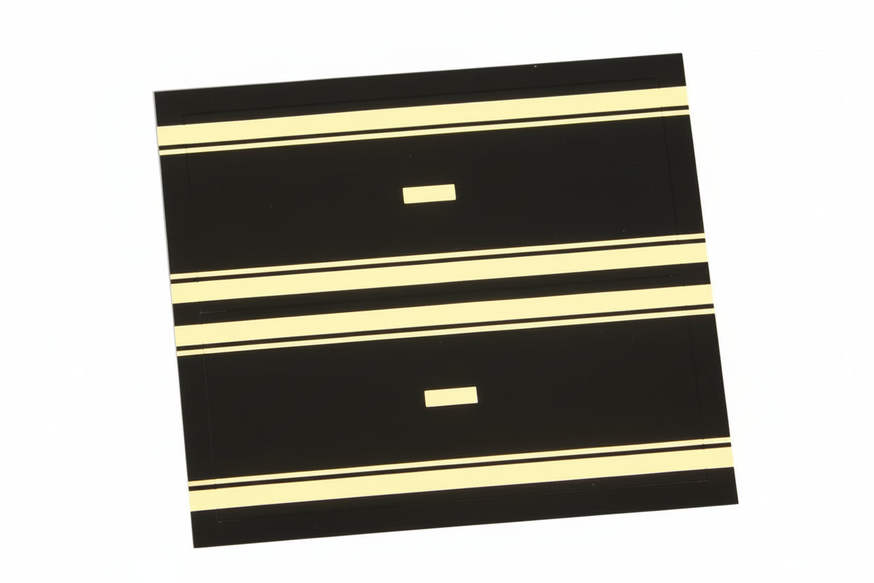 Black and gold embossed label with hyphen for album spine labeling/organizing on a white background.