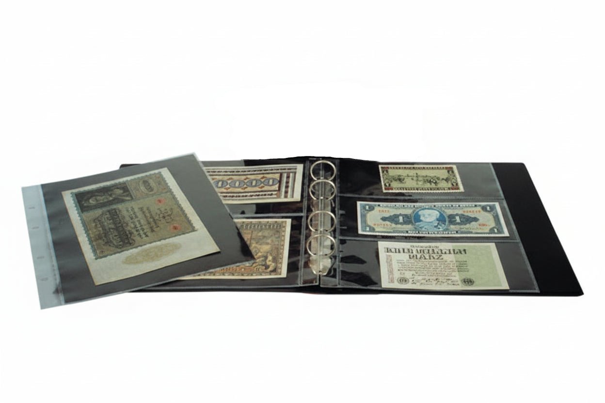 Collection of vintage banknotes inside the refill pages in an open ARTline album on a white background