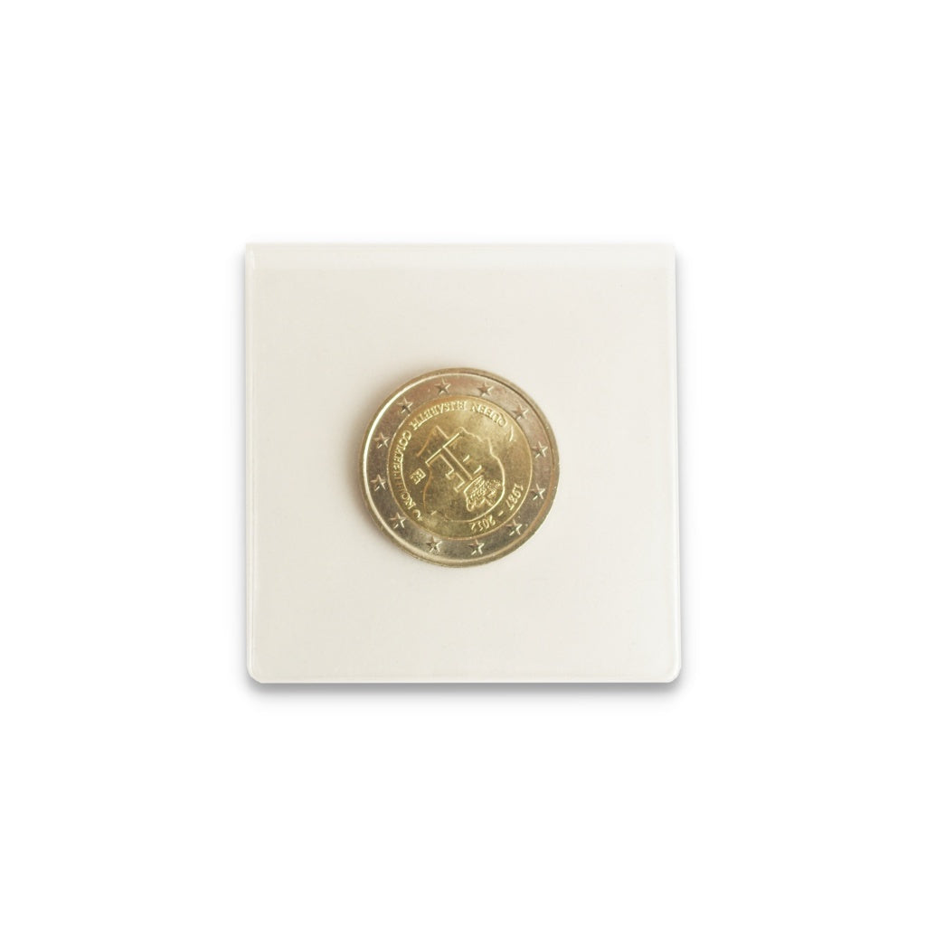 Gold coin in a protective double pocket 2x2 coin holder on a white background