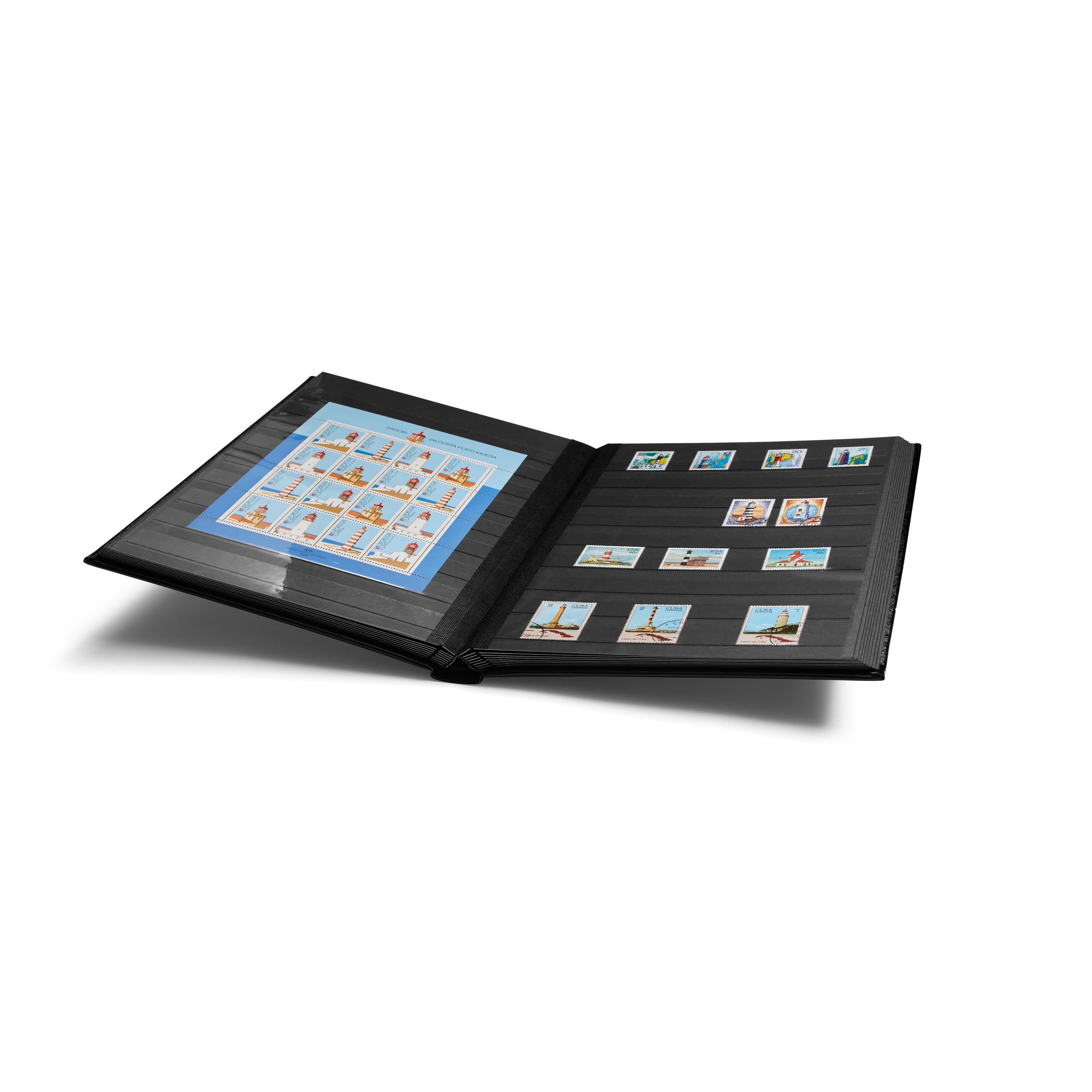 Open black stamp album stockbook with black pages holding a collection of stamps on a white background