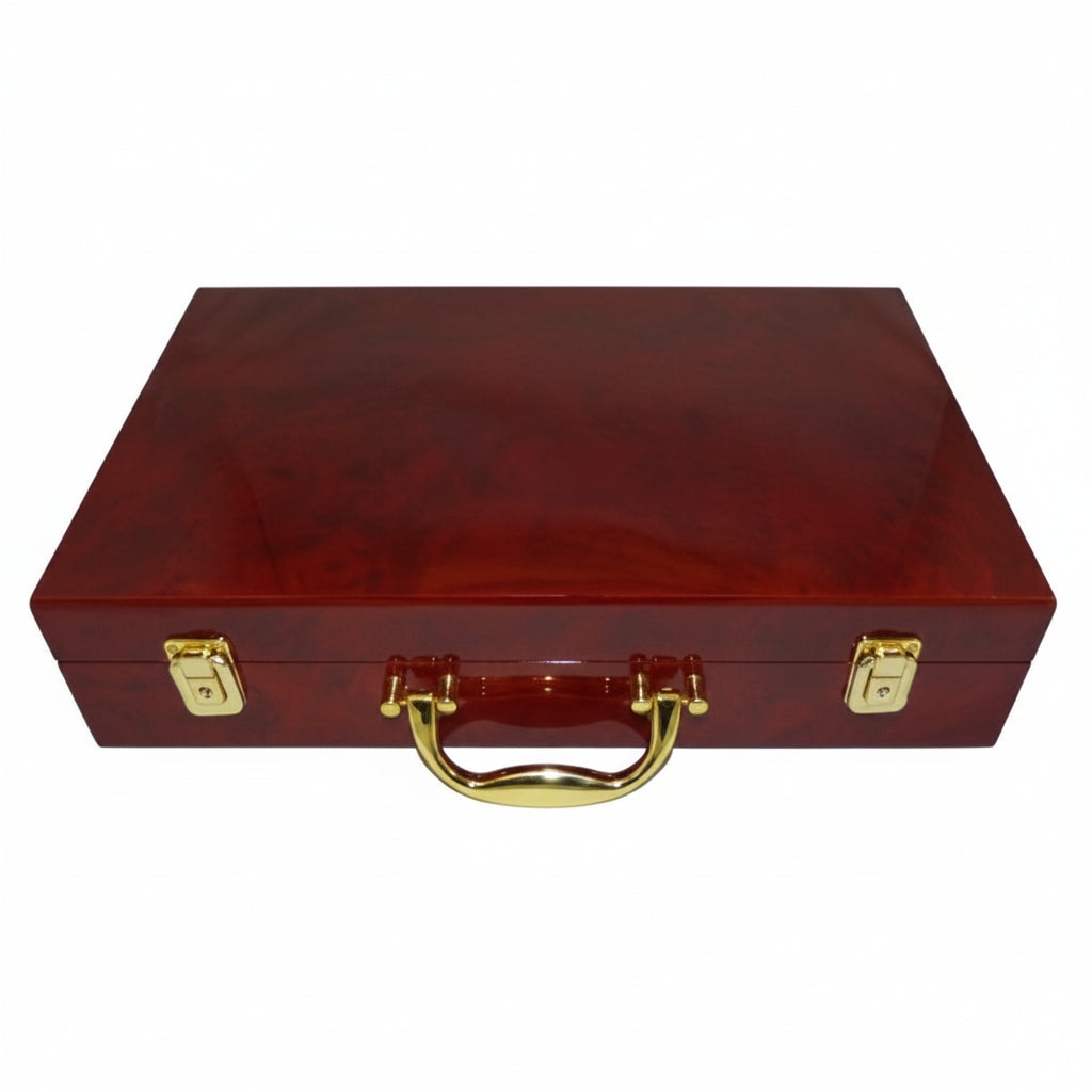 Closed burlwood coin briefcase that has a gold handle and two snap locks on a white background
