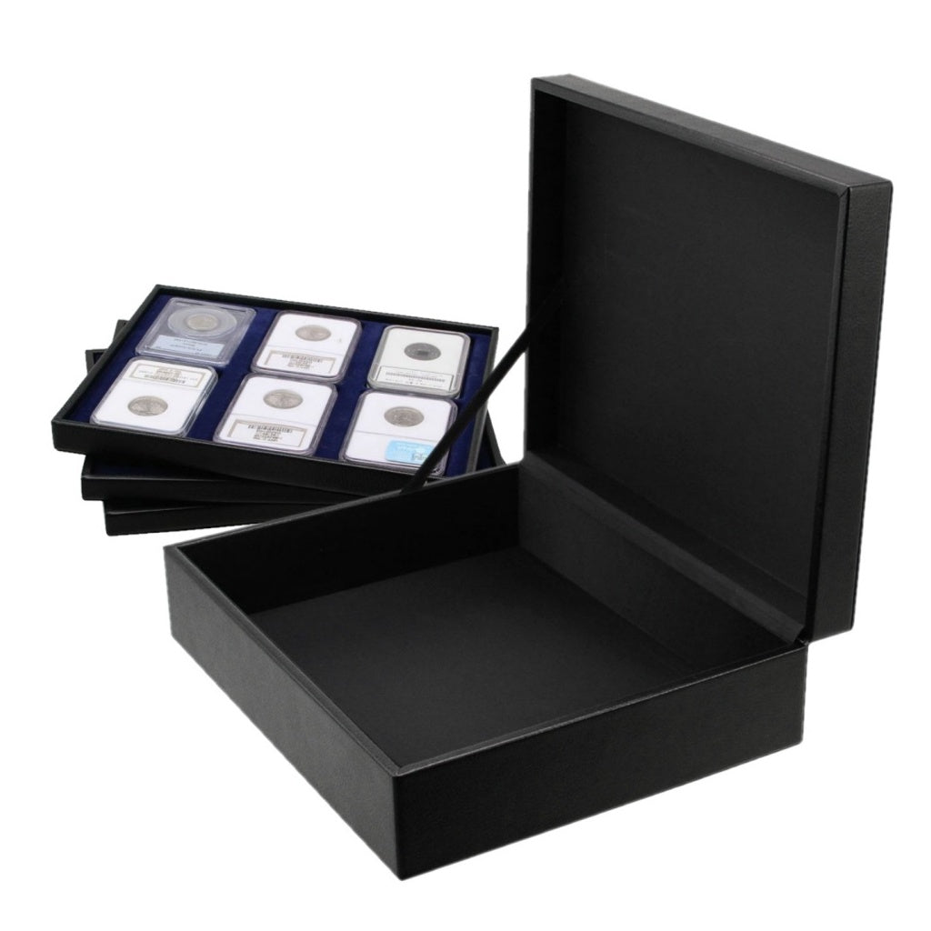 Open black leather coin display case accompanied by coin trays holding a collection of graded coin slabs on a white background.