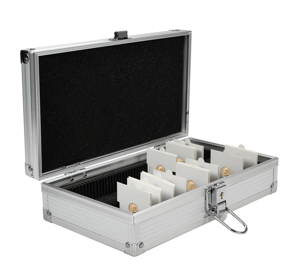 Open aluminum coin case with individual compartments holding 2x2 coin flips/holders, on a white background