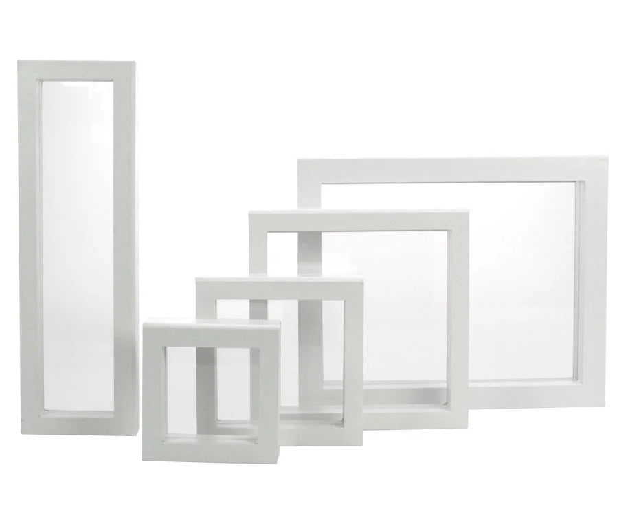 Set of white picture frames/shadowboxes with transparent window made of flexible film of different sizes on a white background