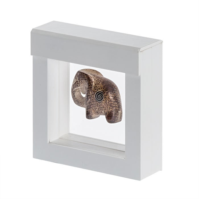 White square frame/shadowbox with transparent window made of film that is molded to an elephant sculpture on a white background