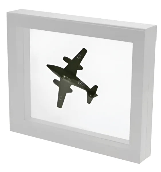 White square frame/shadowbox with transparent window made of film that is molded to a model airplane on a white background