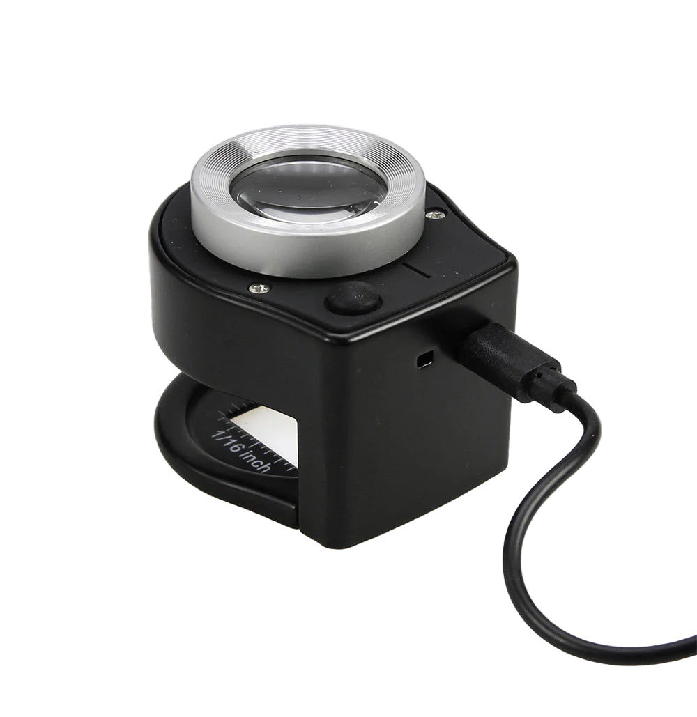 Hands-free digital magnifier with measuring scale and USB connection on a white background