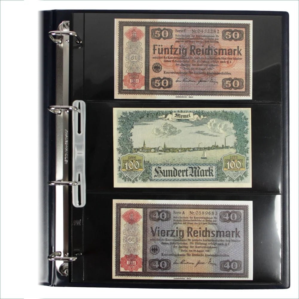 Open blue collection album displaying a page with 3 vintage german banknotes on a white background