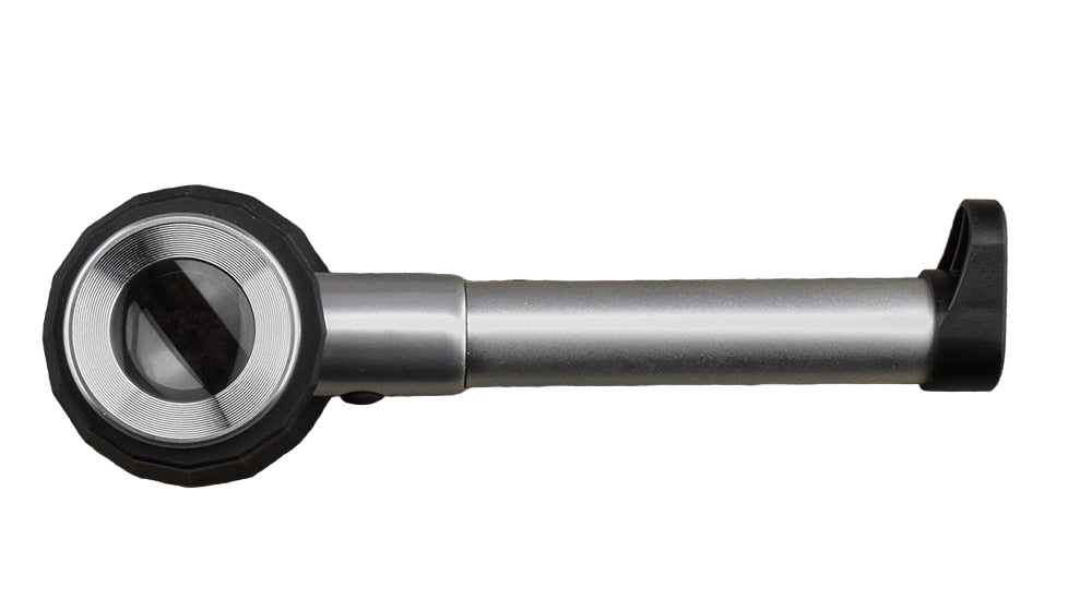 Silver magnifying glass with black accents on a white background