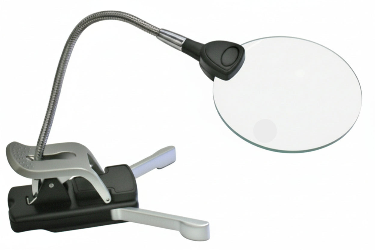 Illuminated magnifying glass with flexible arm and clip (to clamp on a table) on a white background