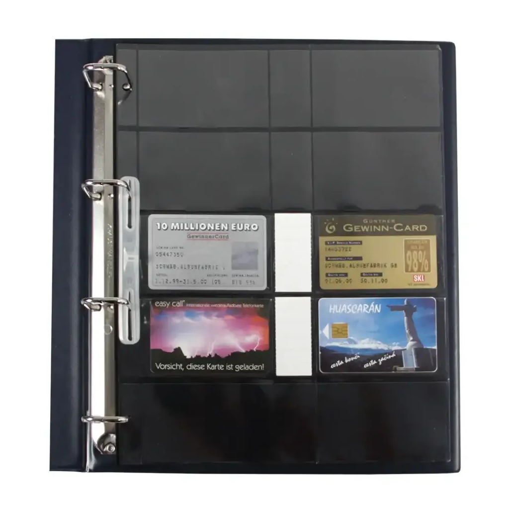 Open blue collection album displaying a page with collectible phone cards and blank labels on a white background