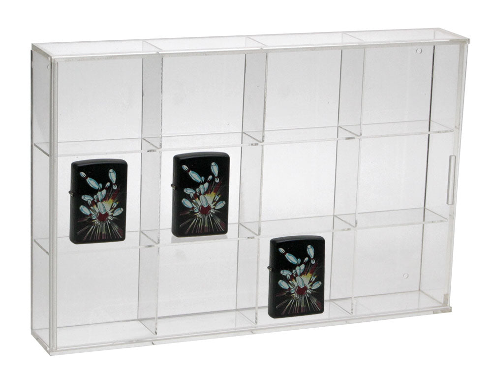 Clear acrylic display case with 12 compartments filled with various Zippo lighters on a white background