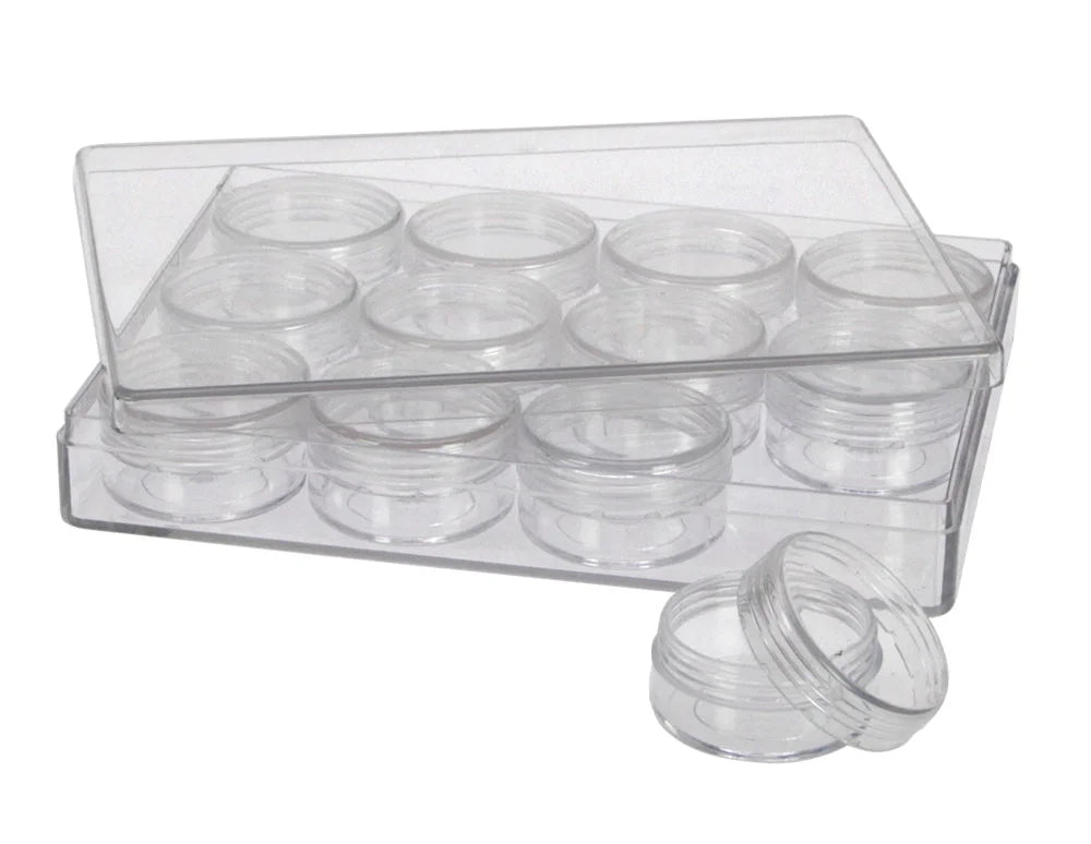 Clear plastic container with the lid ajar, and filled with 12 small removable round jars on a white background