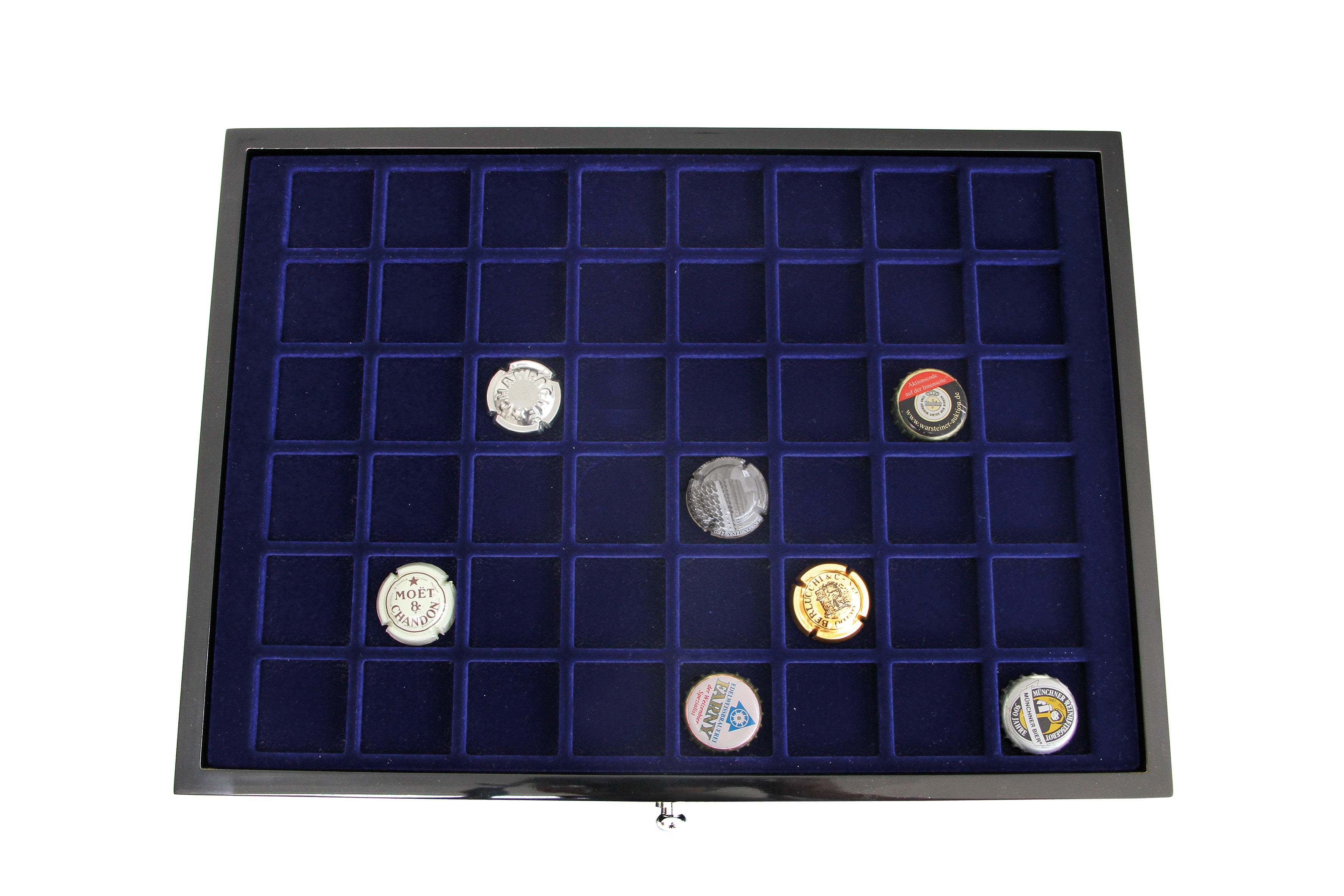 Black coin collection drawer with blue interior tray with square compartments on a white background