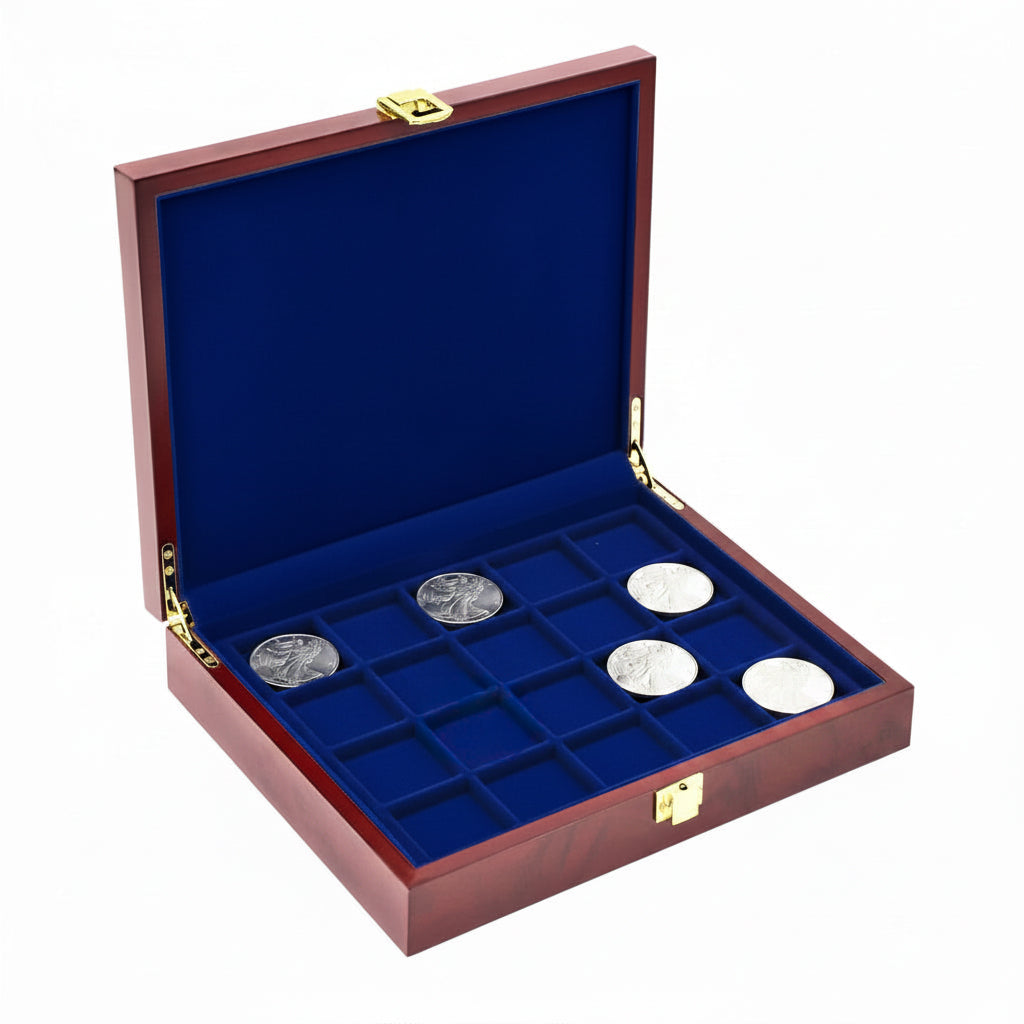 Open burlwood coin collection box with blue velvet trays holding a Silver Eagle coin collection on a white background