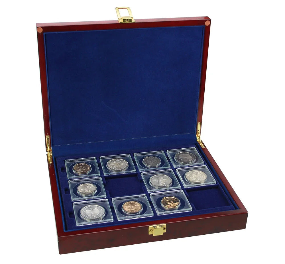 Open burlwood coin collection box with blue velvet trays holding a 2x2 coin flip collection on a white background
