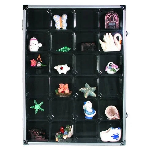 Aluminum display case with 24 compartments filled with mini collectibles closed with an acrylic lid on a white background