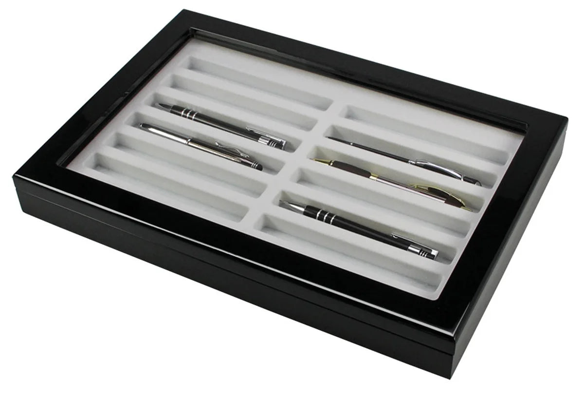 Set of pens in a black wooden high gloss display case with a beige/grey tray insert and an acrylic glass lid on a white background
