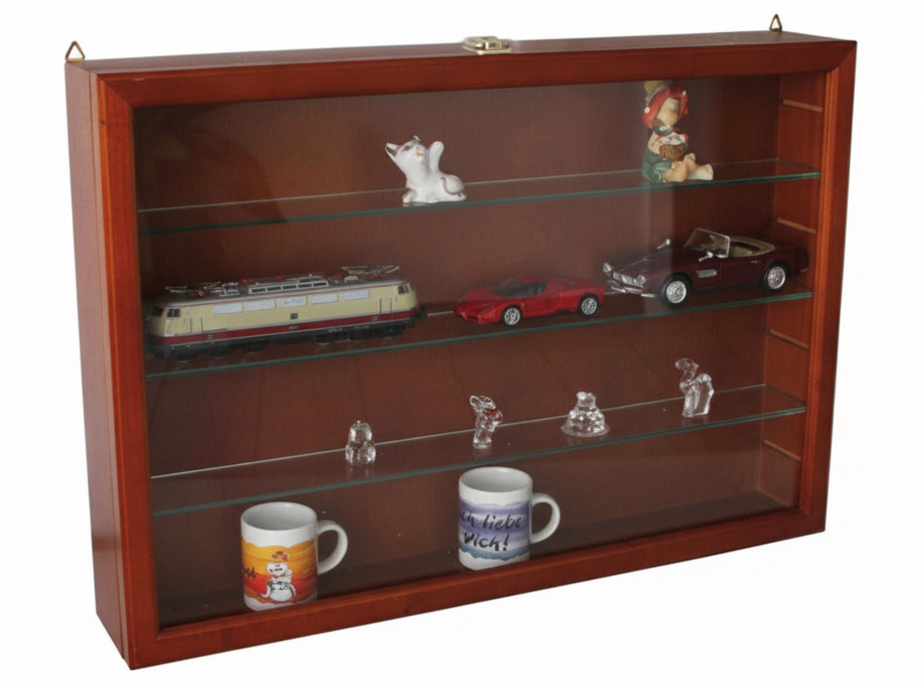 Wooden display cabinet curio with glass shelves containing model cars, figurines, and mugs on a white background.