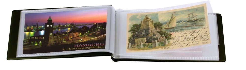 Open postcard pocket album showing postcards of Hamburg and a castle with text on a white background