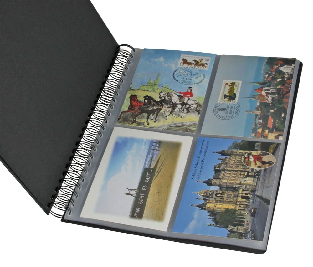 Spiral-bound album with postcards featuring scenic and historical images on a white background