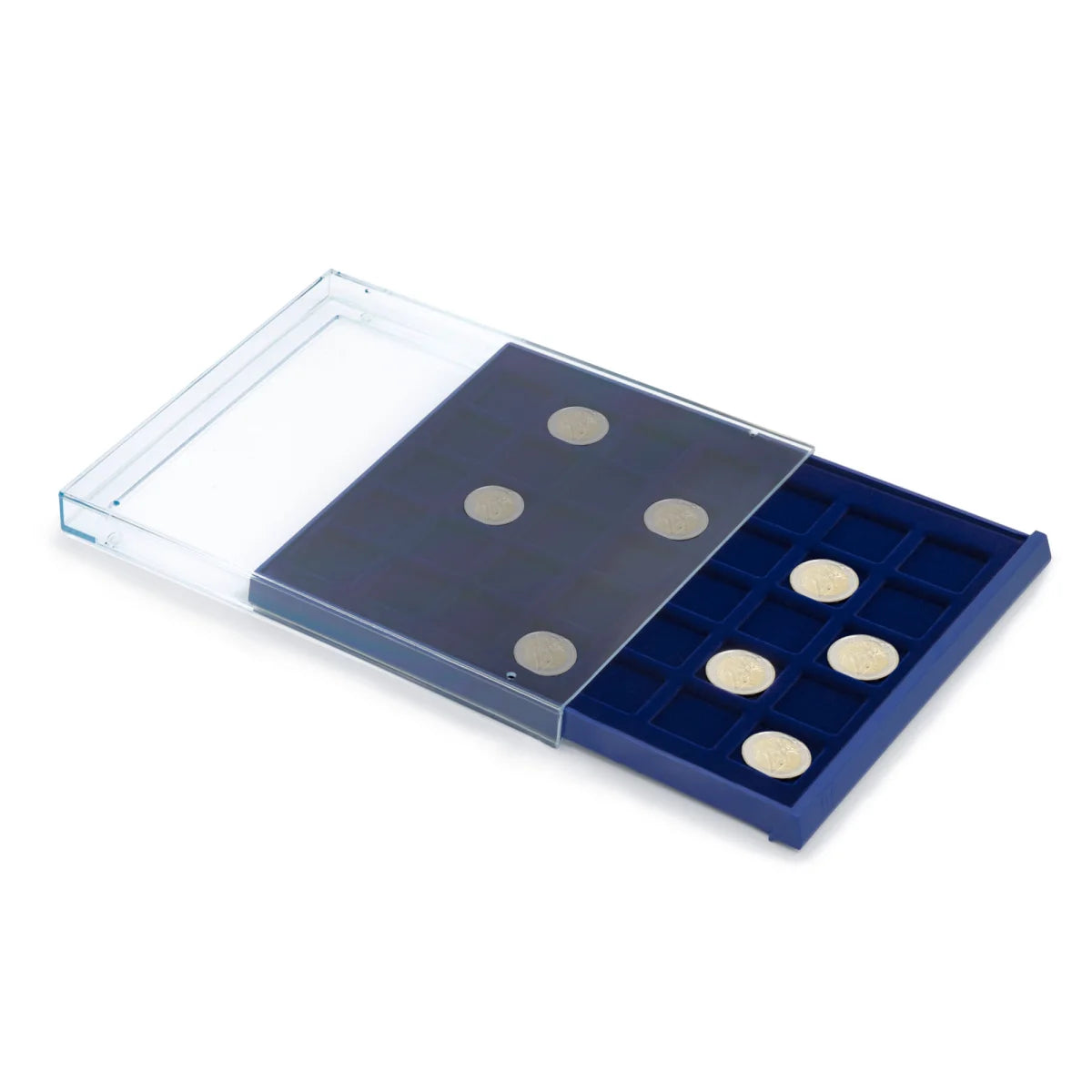 Open acrylic stackable drawer unit with a blue velvet tray and square compartments with a collection of coins on a white background