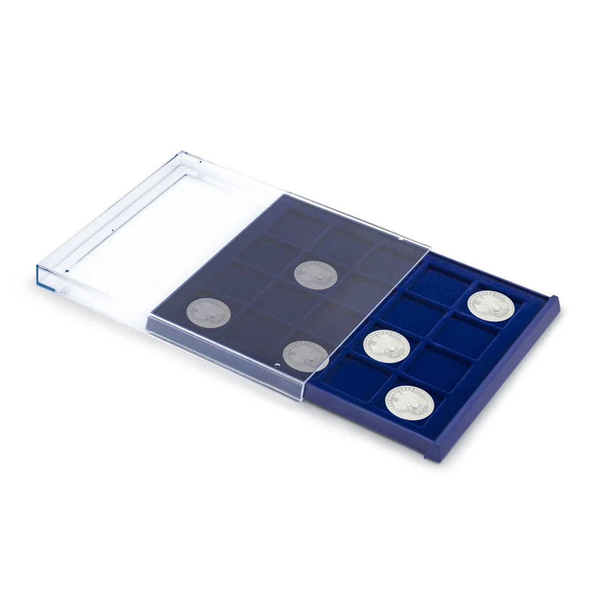 Open acrylic stackable drawer unit with a blue velvet tray and square compartments with coins on a white background