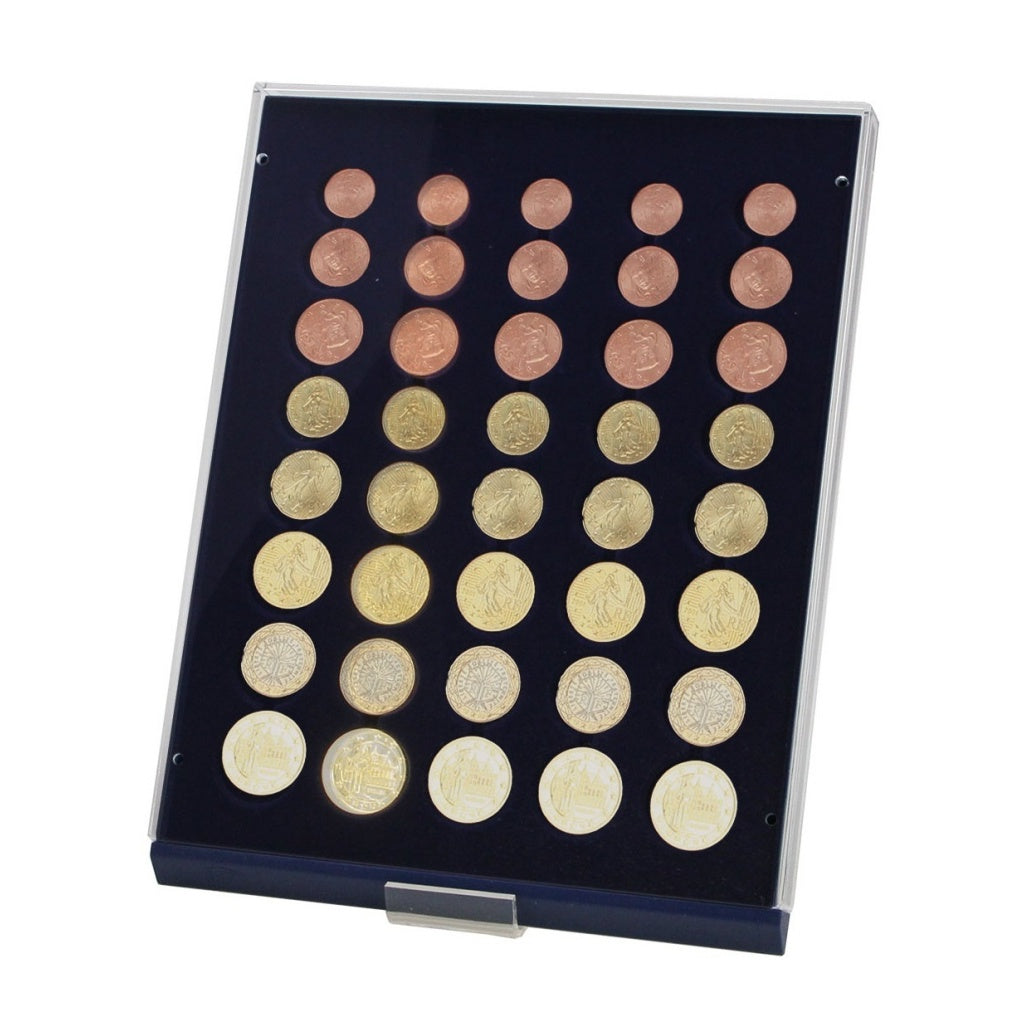 Acrylic stackable drawer unit with a blue velvet tray and rectangular compartments holding euro coin sets propped up on an acrylic easel on a white background
