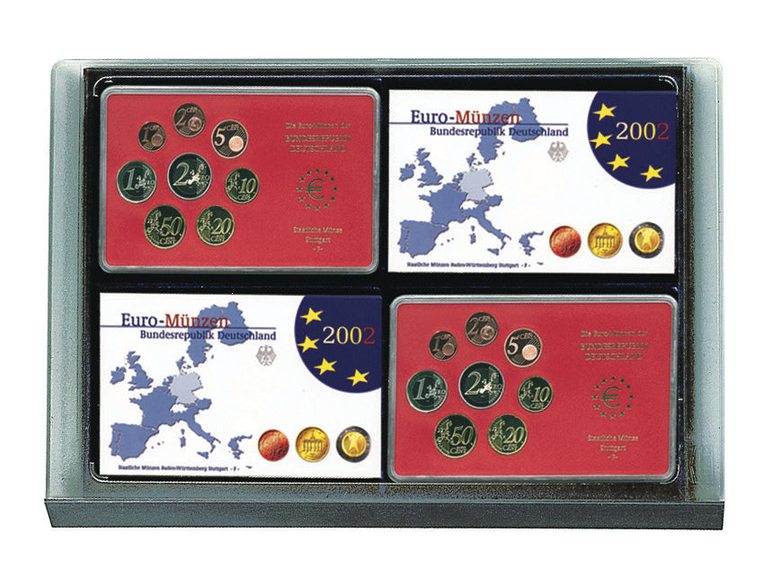 Overhead image of a four coin proof sets within a display drawer unit on a white background