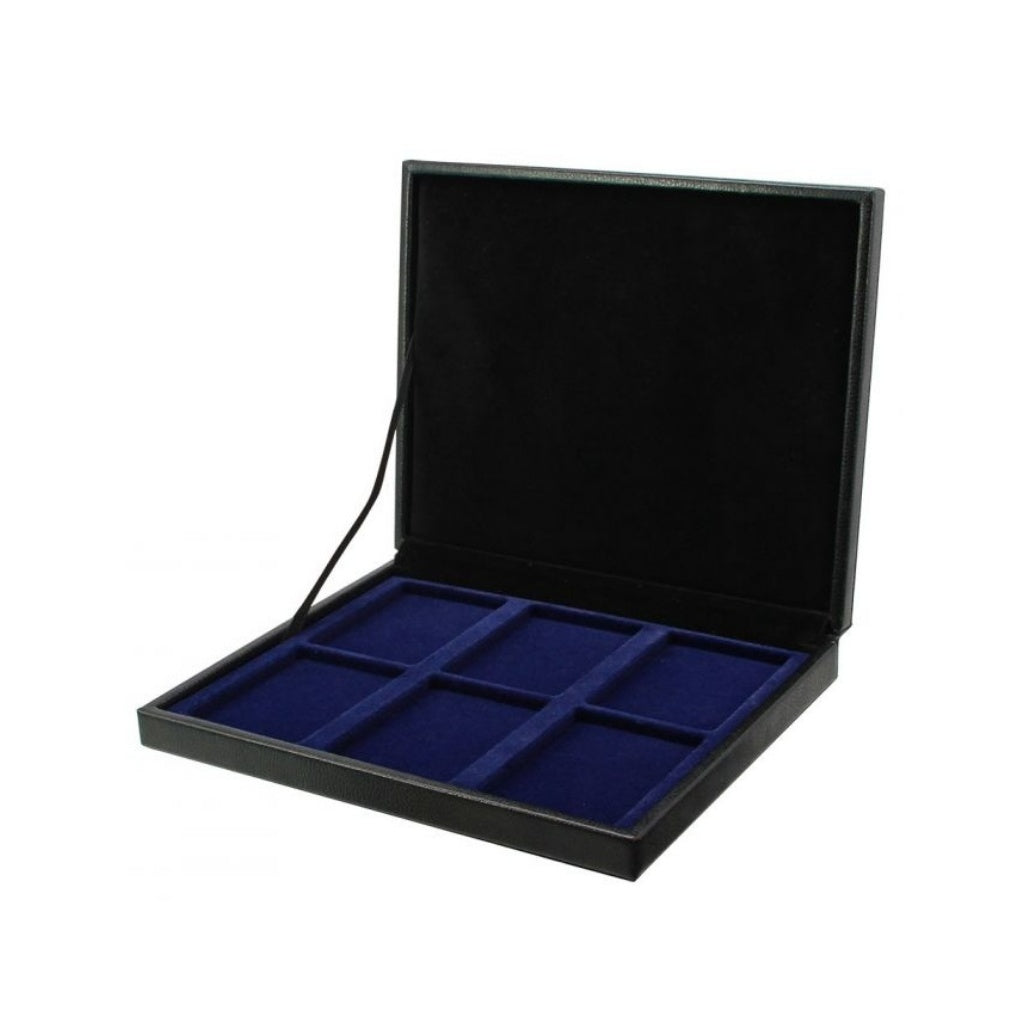A blue velvet tray in an open black leather coin presentation case, on a white background.