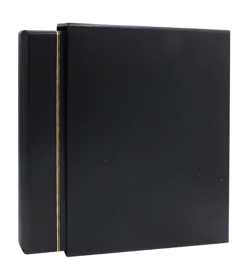 Black Morocco album with a gold embossed line, inserted into the black Morocco slipcase on a white background