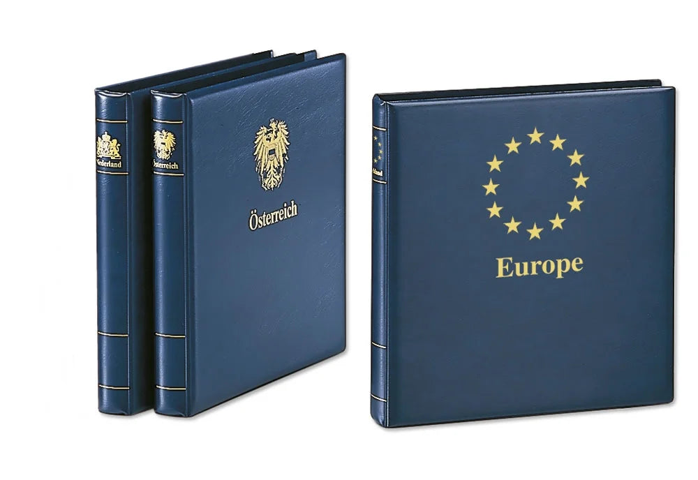 3 blue collector albums with gold embossed designs and the corresponding country name written on the cover & spine on a white background