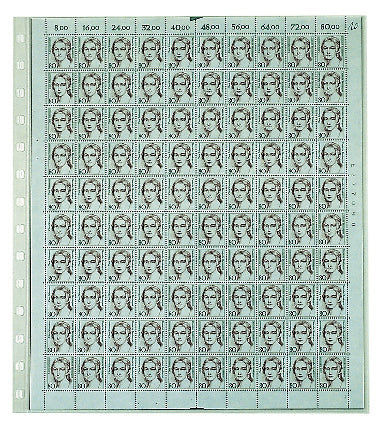 Sheet of postage stamps inside a transparent album page on a white background