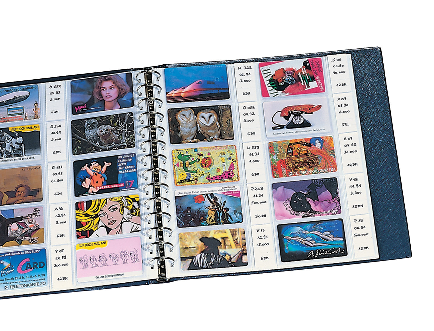 Collection of telephone cards alongside labels in an open blue album on a white background