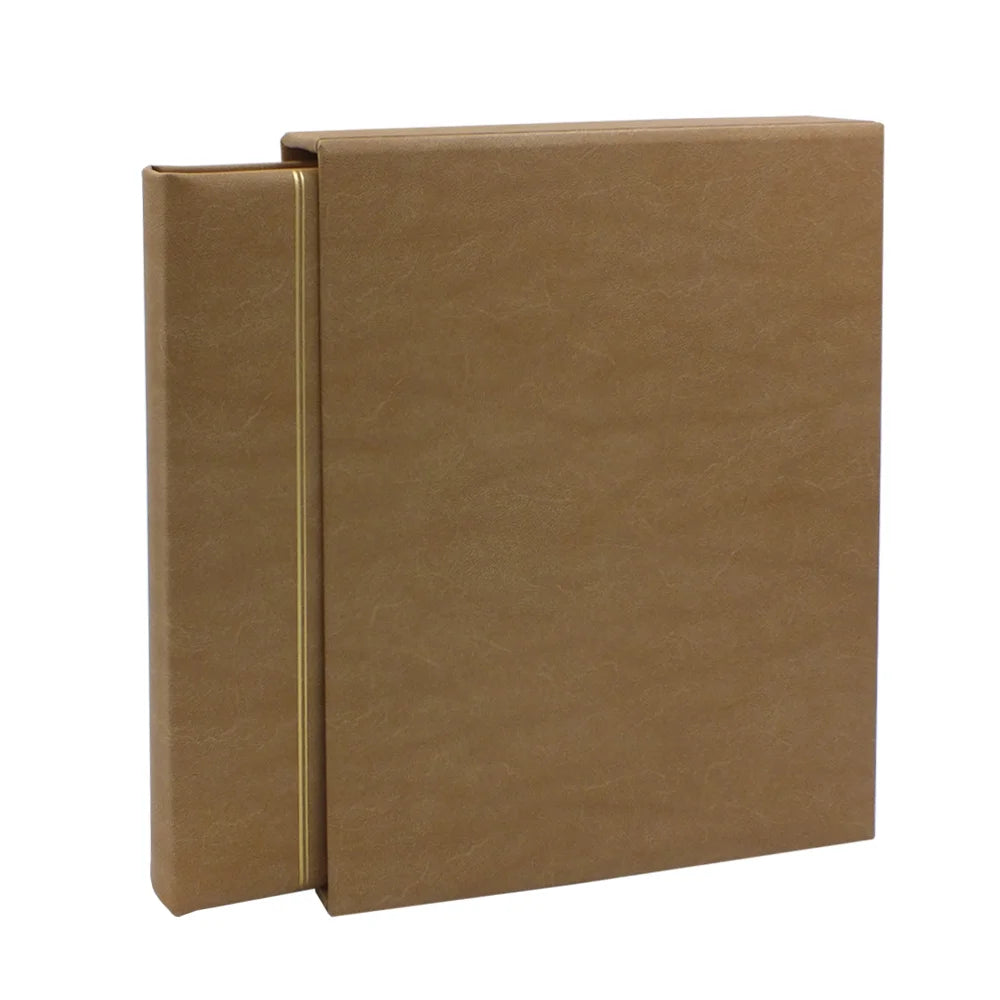 Tan collector album with a gold embossing halfway slid into a matching slipcase on a white background