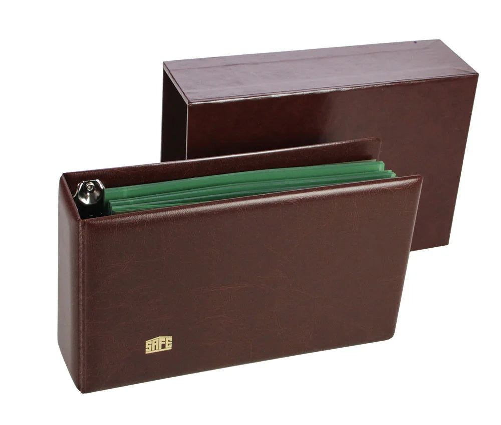 Closed brown collector album with green pages alongside the matching slipcase on a white background