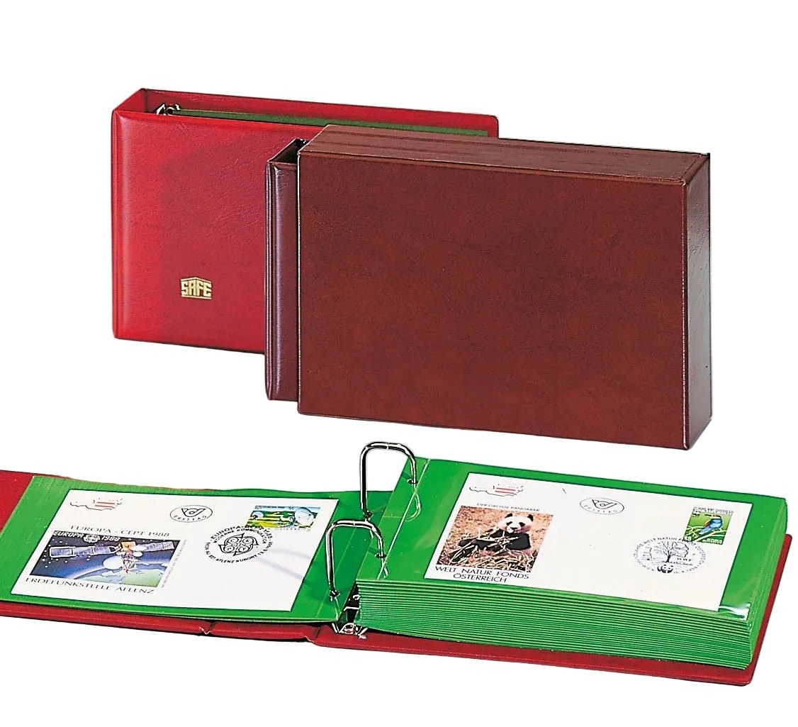 Closed red collector album with green pages alongside the matching slipcase with an open binder showing green pages & covers on a white background