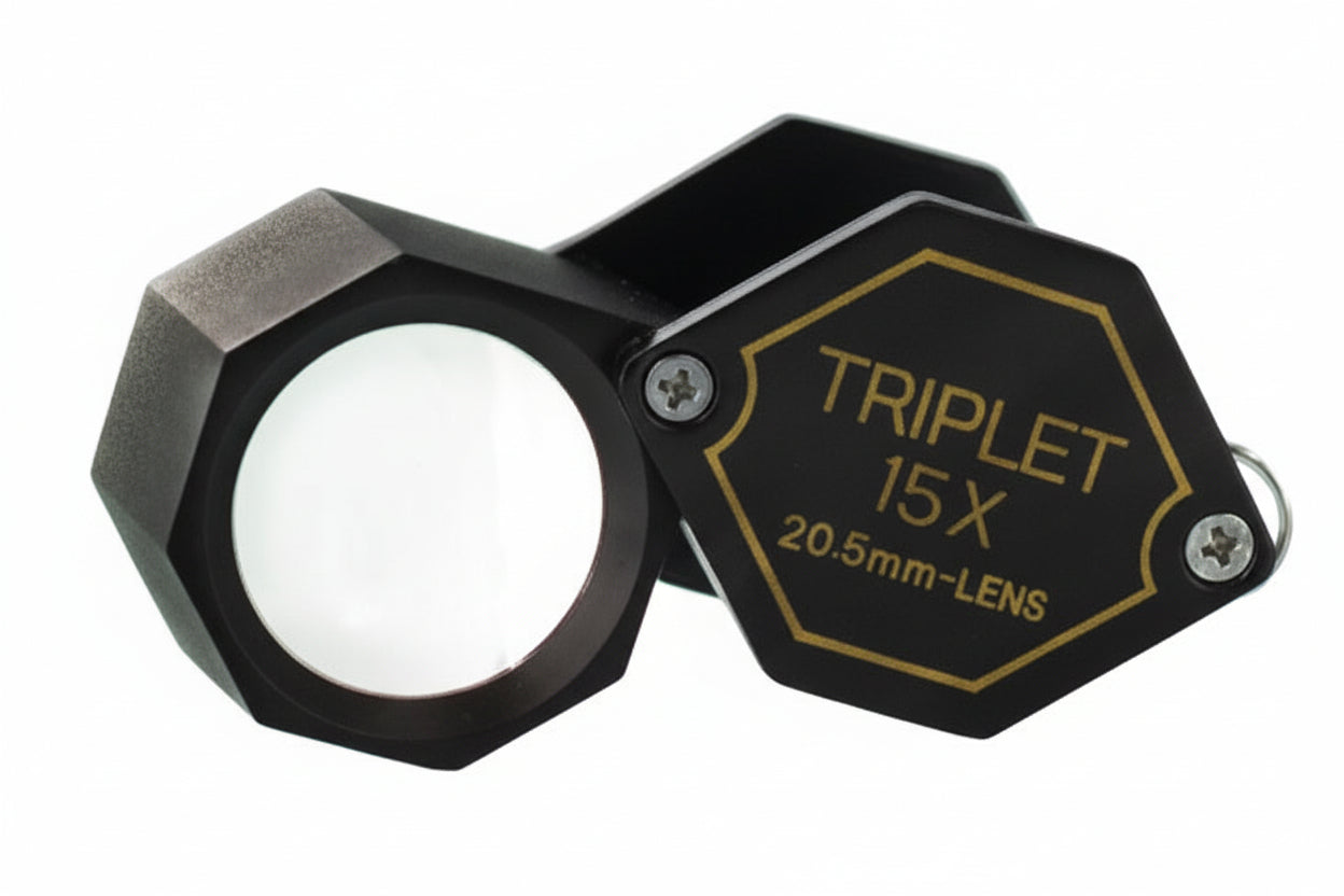 Triplet magnifying glass with 15x magnification and 20.5mm lens on a white background