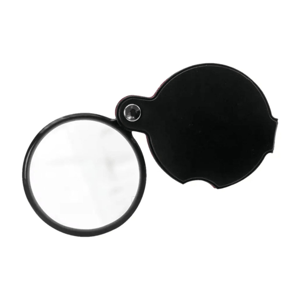 Black magnifying glass with a glass lens that is "swung out" from it's protective case on a white background