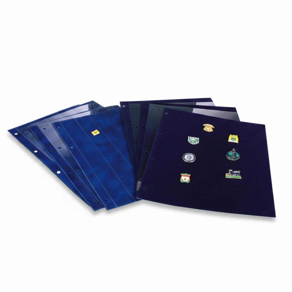 Collection of blue velvet pin pages with various pins on one of them, on a white background
