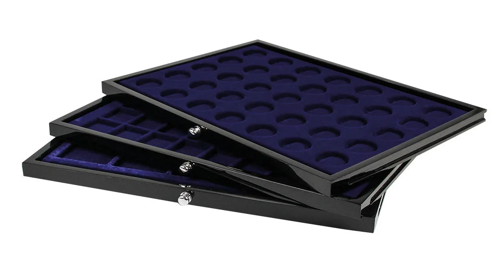 Set of three black Designer Coin drawer trays with blue velvet interior with multiple compartments on a white background