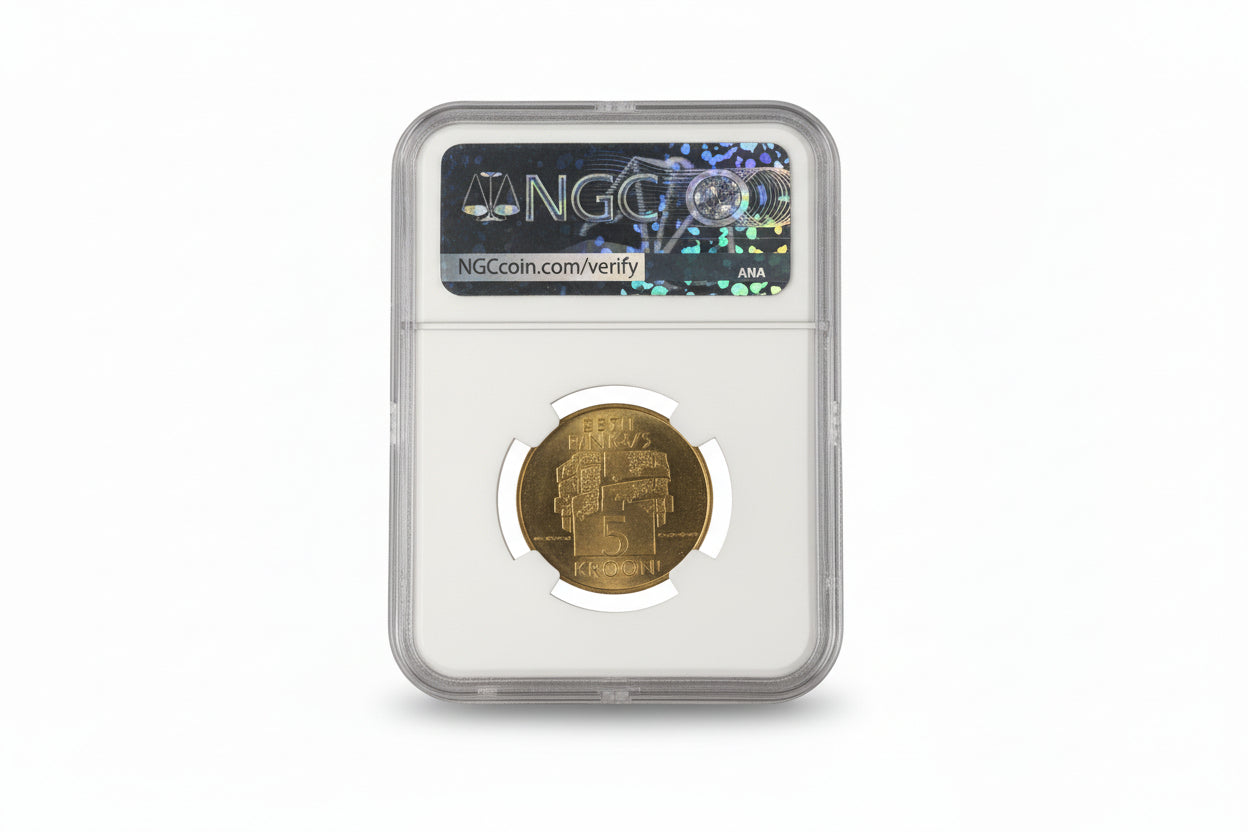 Graded gold coin in NGC holder/slab on a white background