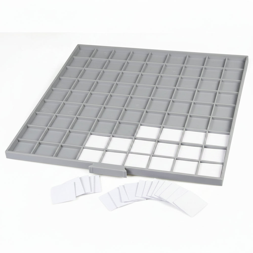Gray grid tray drawer with white labeling inserts on a white background