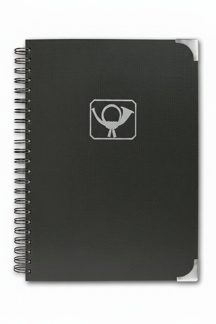 Designer spiral-bound black stamp stockbook with 32 white pages, glassine interleaves, and gold embossed Post Horn cover, on a white background.