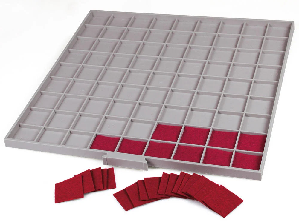 Gray grid tray drawer with red felt inserts on a white background