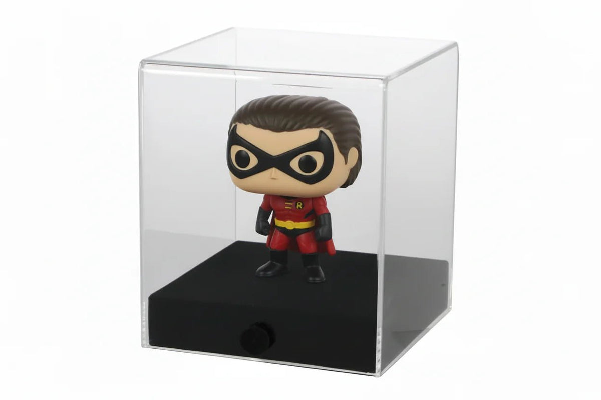 Superhero FunkoPop inside an acrylic display case with a black base on a white background