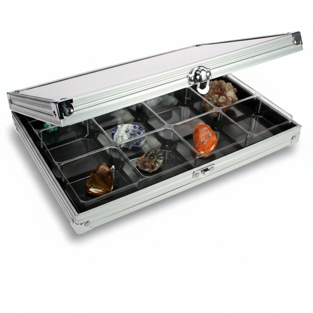 Aluminum display case with compartments filled with rocks & minerals, open ajar with an acrylic lid on a white background
