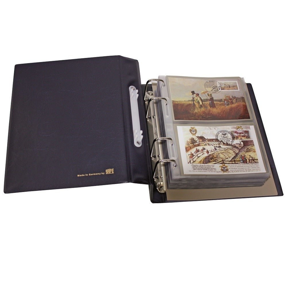 A dark blue four-ring binder with 2-pocket black pages holding collectible envelopes, shown open on a plain white background.